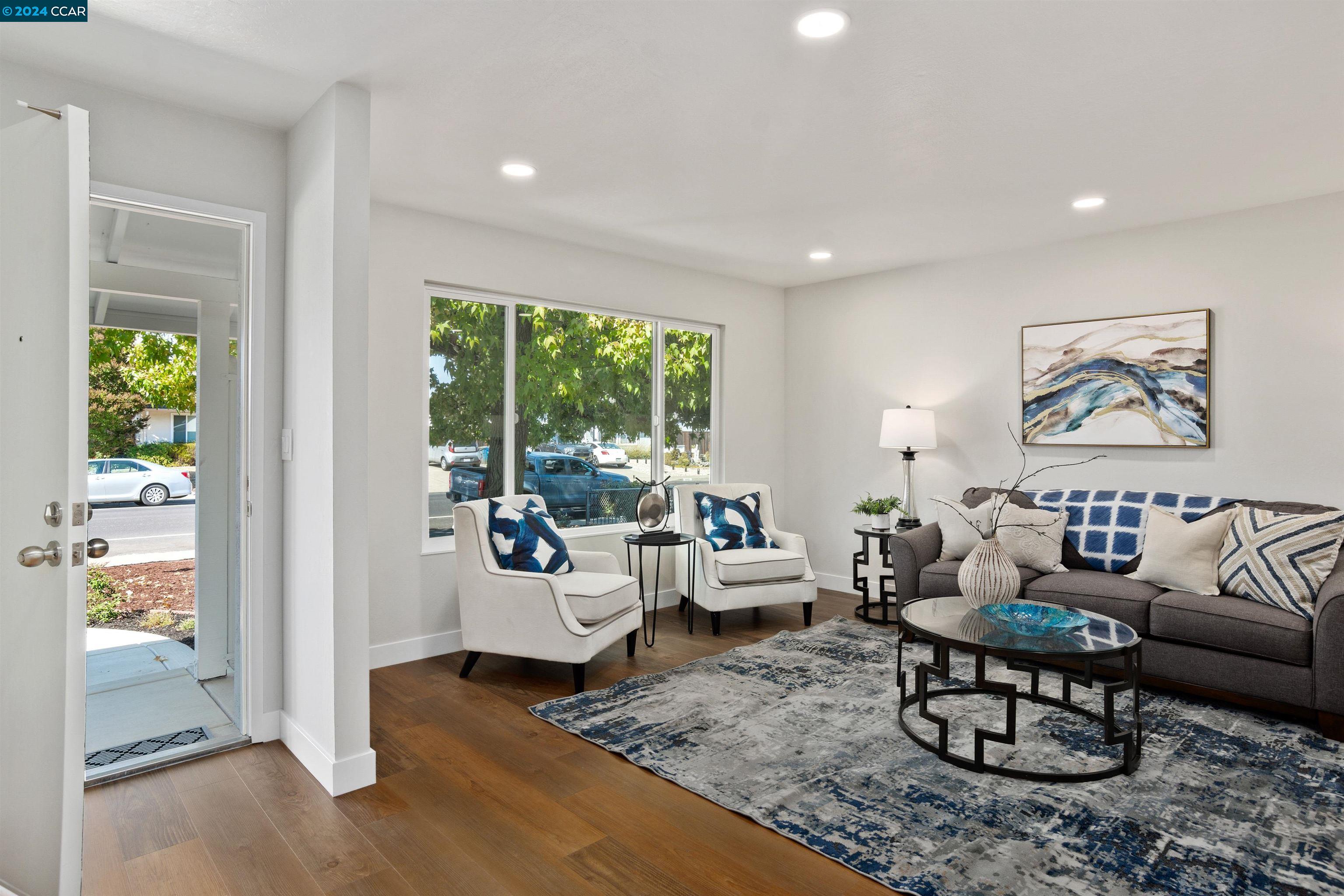 Pine Valley Road San Ramon, CA 94583 - Photo 7 of 34 a living room with furniture and a large window