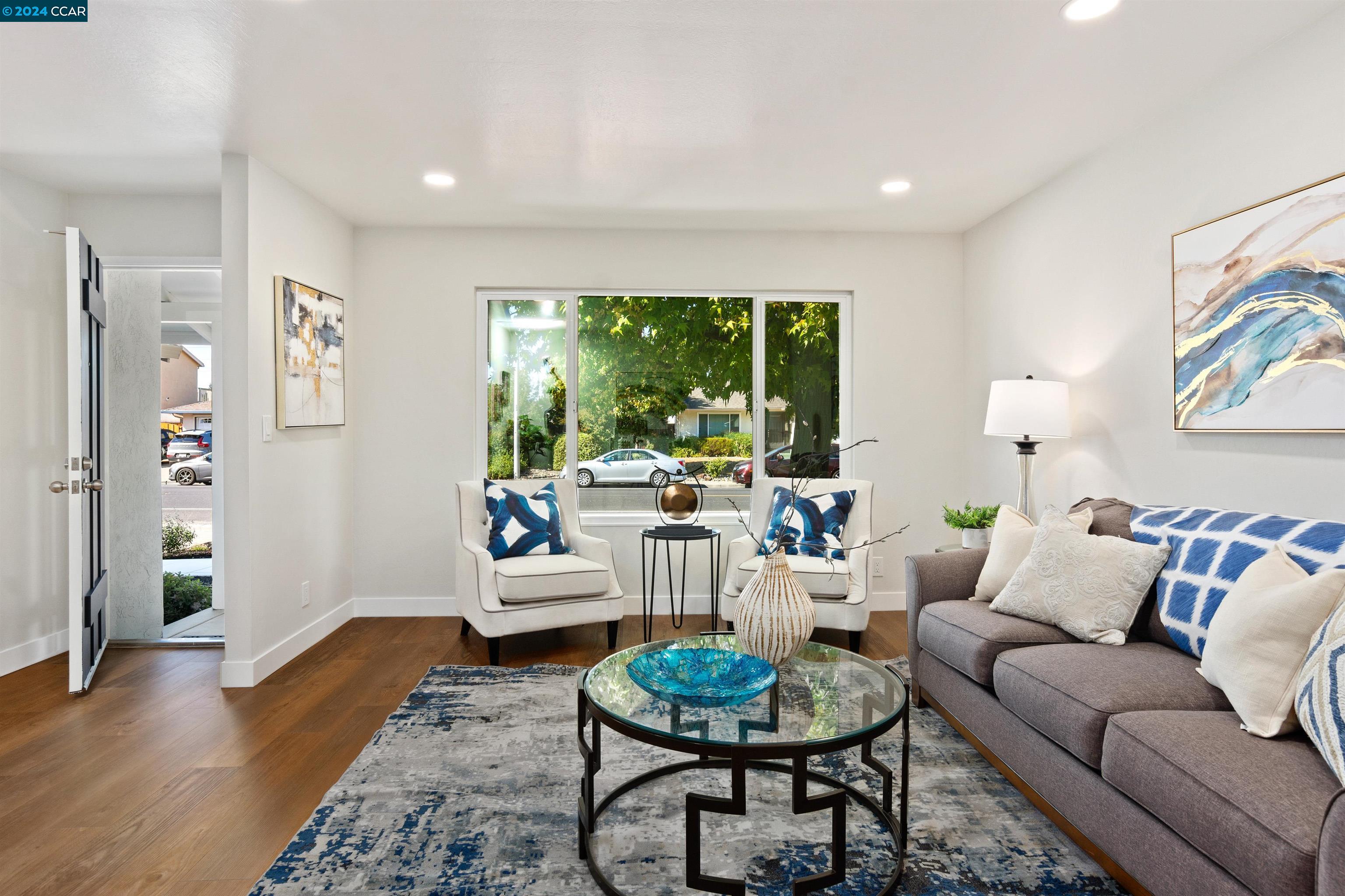 Pine Valley Road San Ramon, CA 94583 - Photo 8 of 34 a living room with furniture and a wooden floor