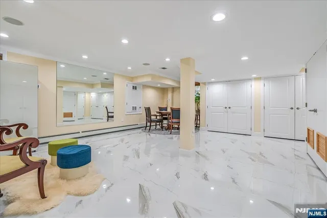 a view of a livingroom with furniture and a table