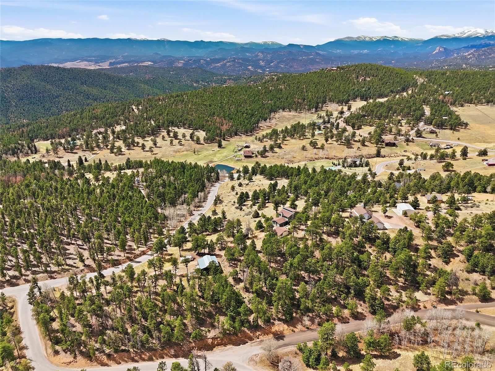 13108 Elsie Road Conifer, CO 80433 - Photo 19 of 49 a view of a mountain with an outdoor space