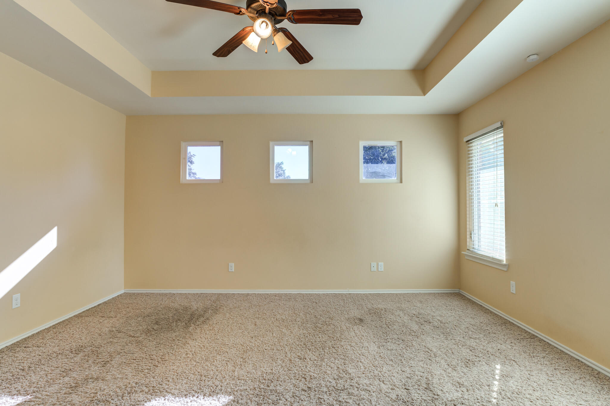4802 Amherst Street Lubbock, TX 79416 - Photo 23 of 33 a view of an empty room with a window
