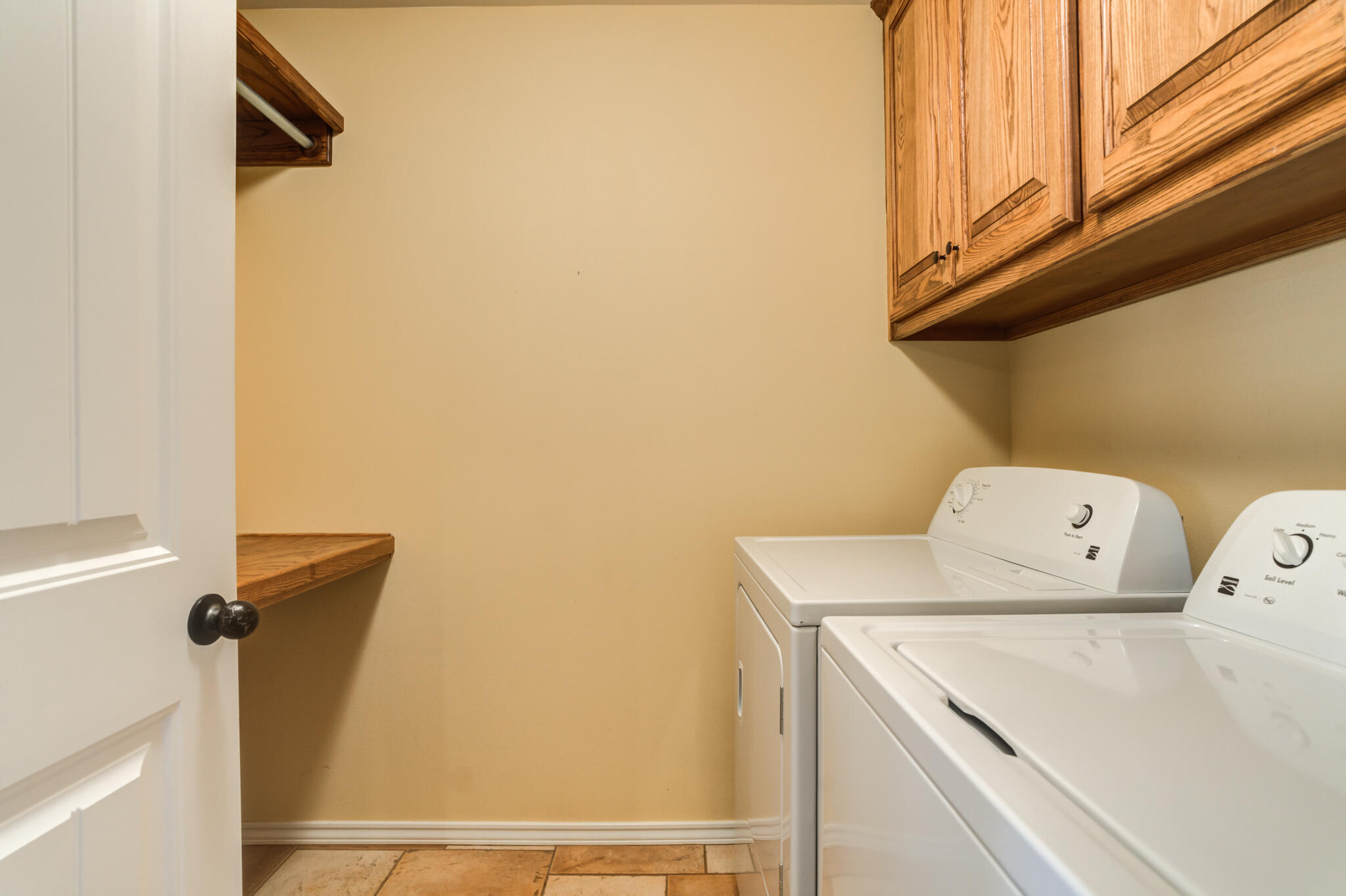 4802 Amherst Street Lubbock, TX 79416 - Photo 29 of 33 a utility room with dryer and washer