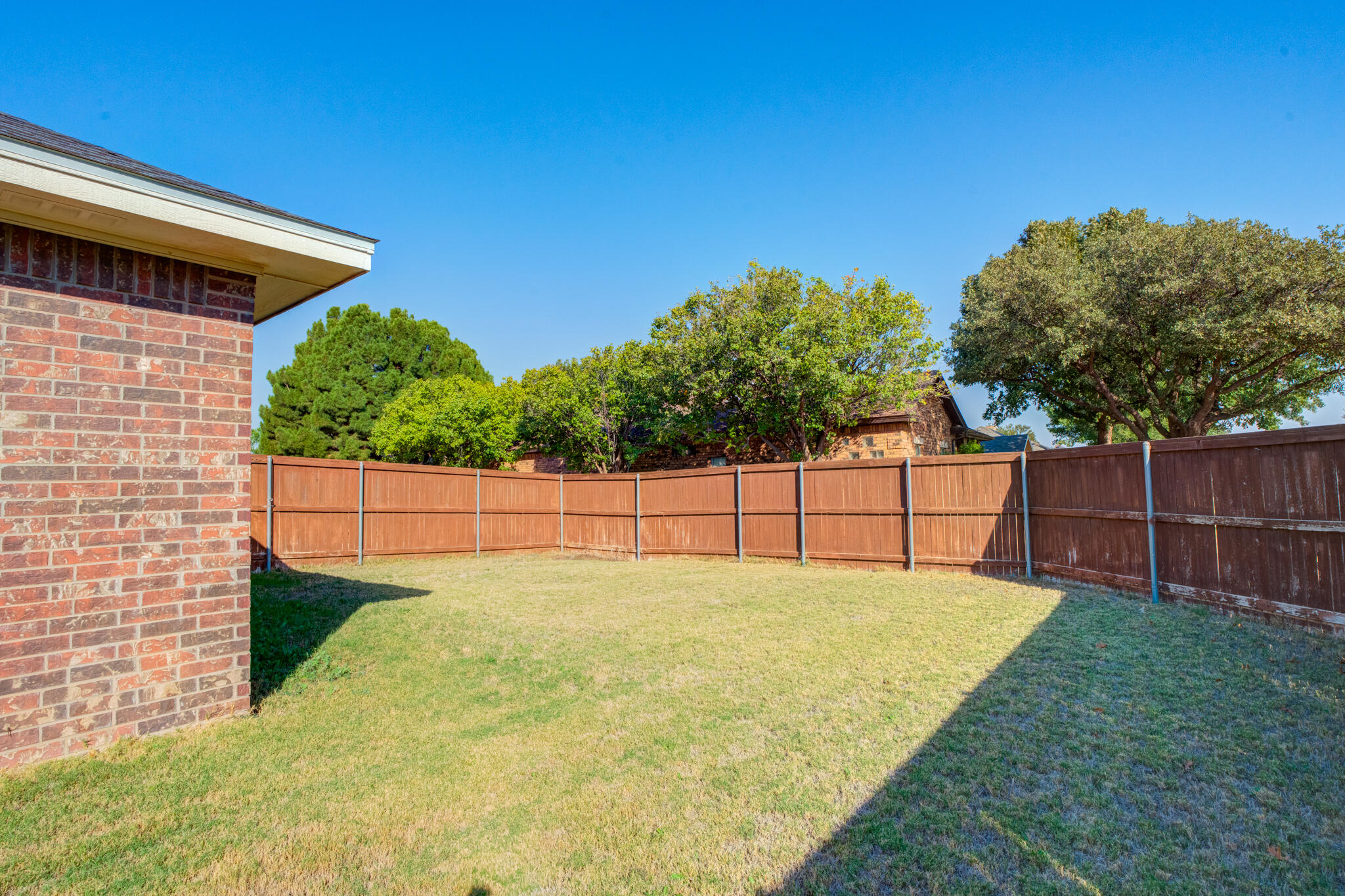 4802 Amherst Street Lubbock, TX 79416 - Photo 32 of 33 a view of a backyard