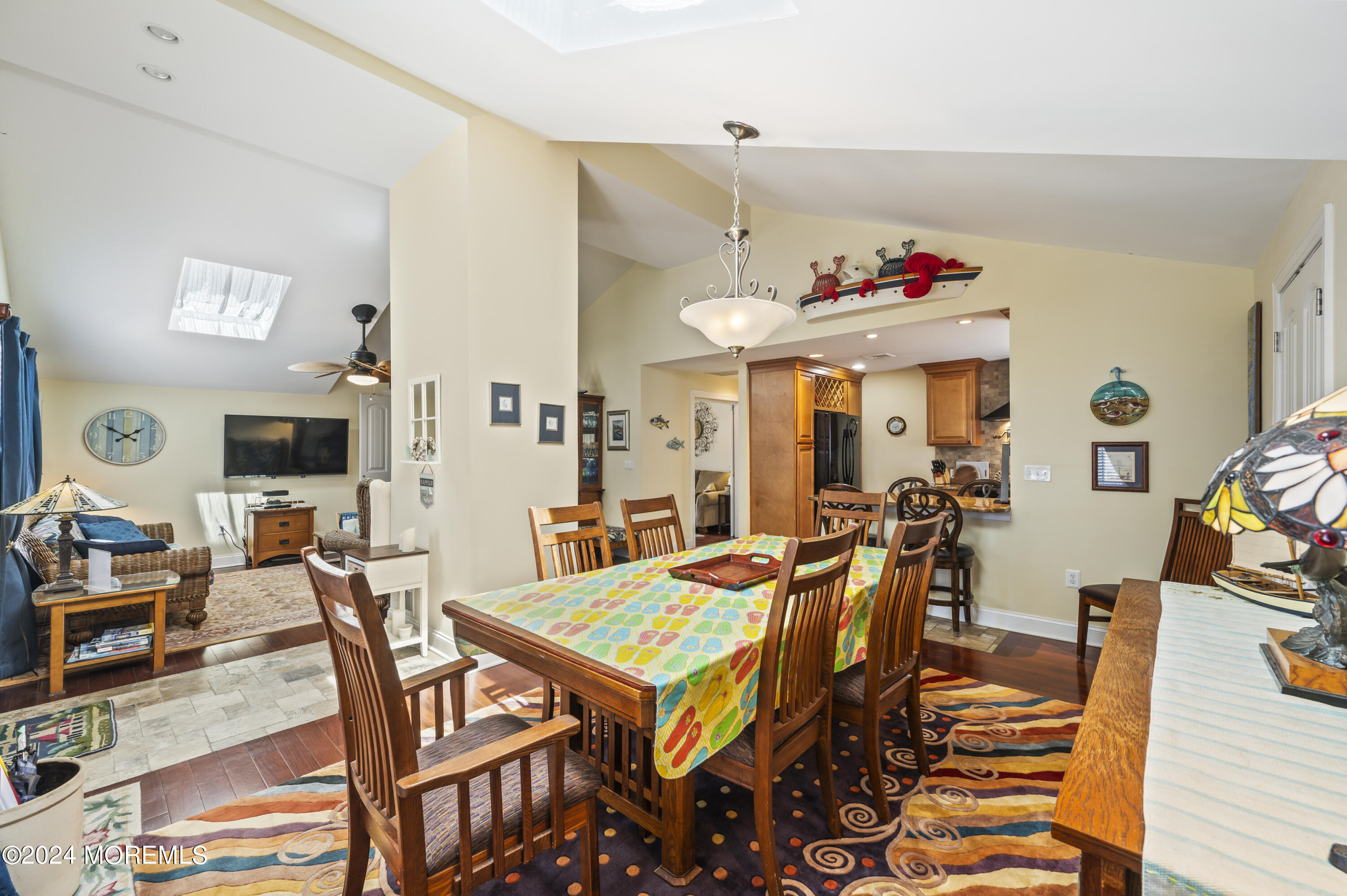 204 Randall Avenue Point Pleasant Beach, NJ 08742 - Photo 12 of 29 a living room with dining room and wooden floor