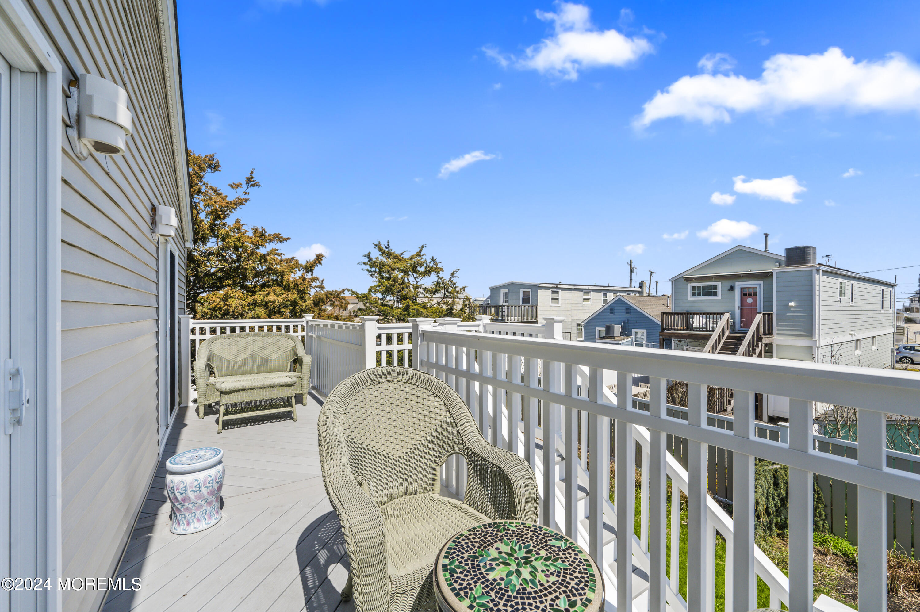 204 Randall Avenue Point Pleasant Beach, NJ 08742 - Photo 20 of 29 a view of a balcony with furniture