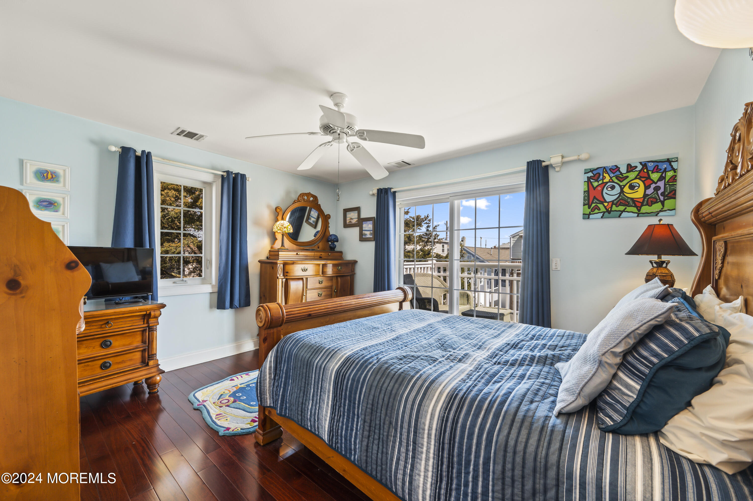 204 Randall Avenue Point Pleasant Beach, NJ 08742 - Photo 22 of 29 a bedroom with a bed and wooden floor