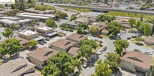 an aerial view of a house with a lake view