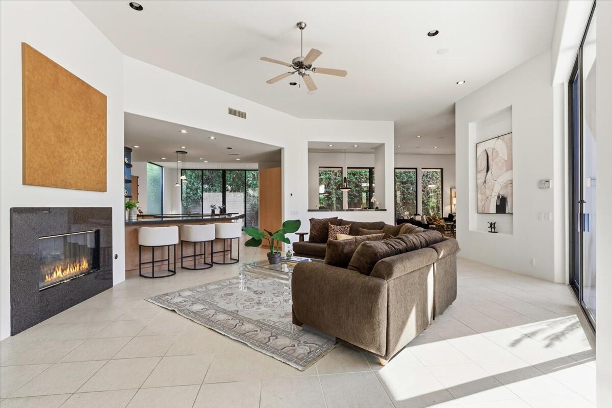 50120 Indian Camp Road La Quinta, CA 92253 - Photo 14 of 28 a living room with furniture and a fireplace