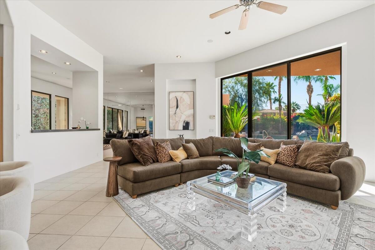 50120 Indian Camp Road La Quinta, CA 92253 - Photo 15 of 28 a living room with furniture and a large window