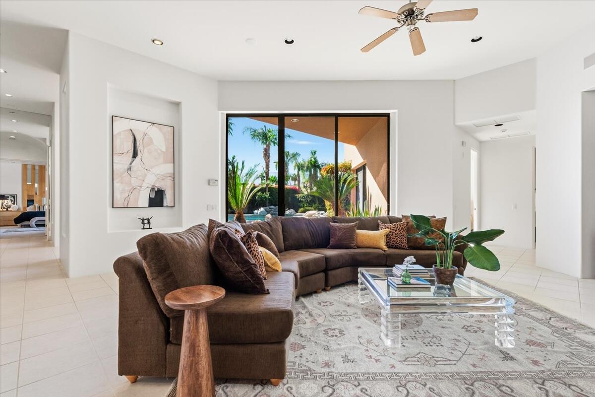 50120 Indian Camp Road La Quinta, CA 92253 - Photo 16 of 28 a living room with furniture and a large window