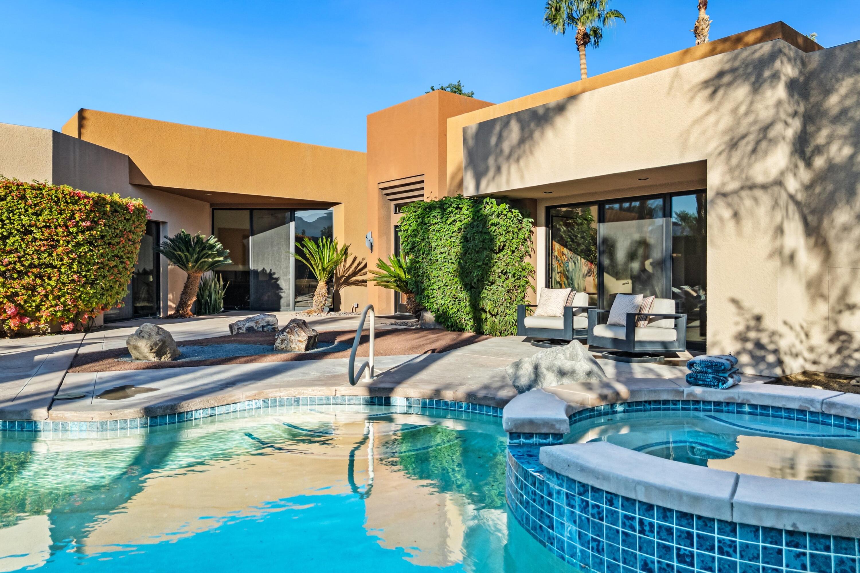 50120 Indian Camp Road La Quinta, CA 92253 - Photo 17 of 28 a view of a swimming pool with sitting area