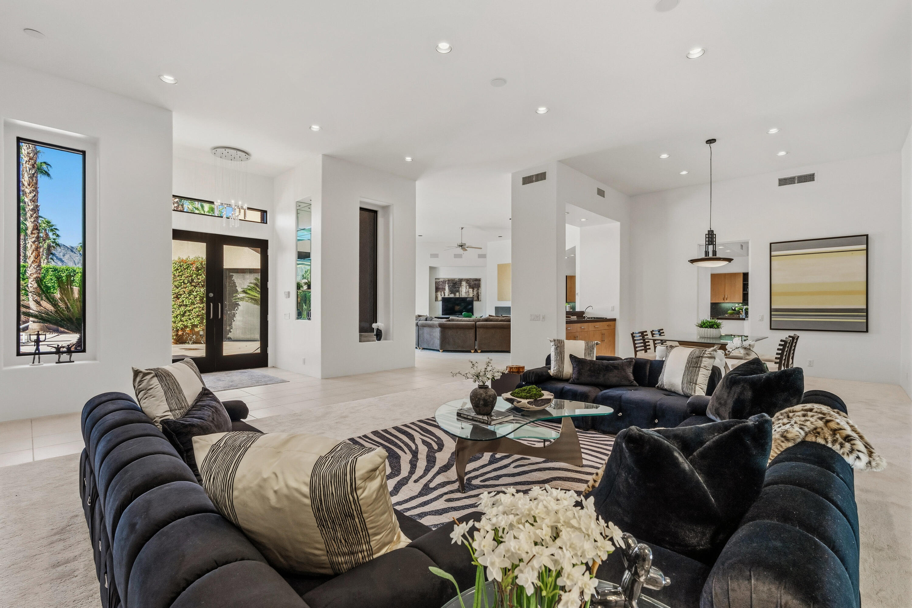 50120 Indian Camp Road La Quinta, CA 92253 - Photo 8 of 28 a living room with furniture and a large window