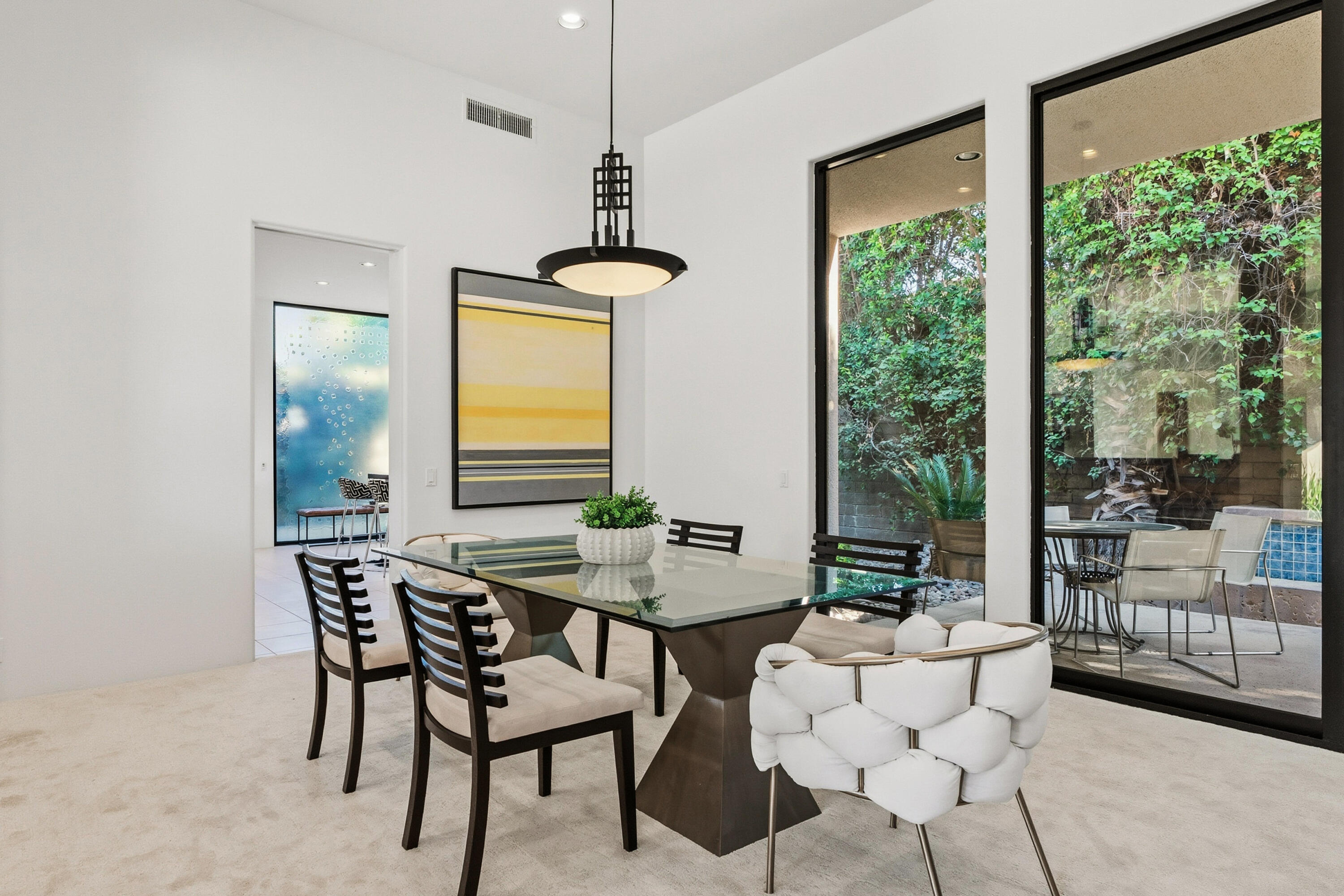 50120 Indian Camp Road La Quinta, CA 92253 - Photo 9 of 28 a view of a dining room with furniture window and outside view