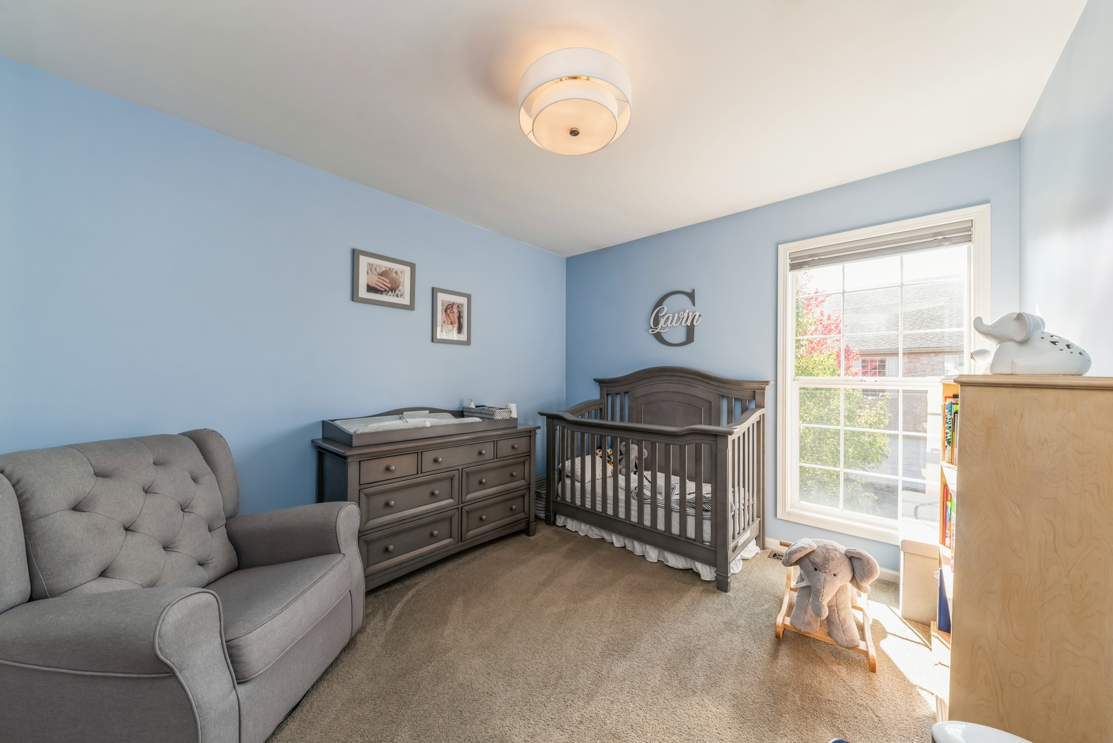 5561 McDonough Road Hoffman Estates, IL 60192 - Photo 10 of 16 a bedroom with furniture and a window