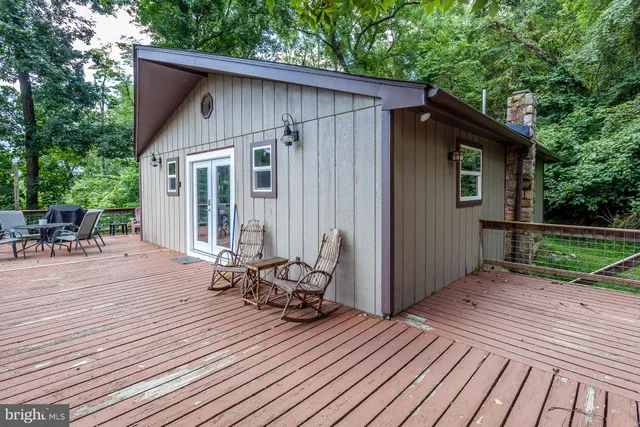 a view of outdoor space with deck and patio