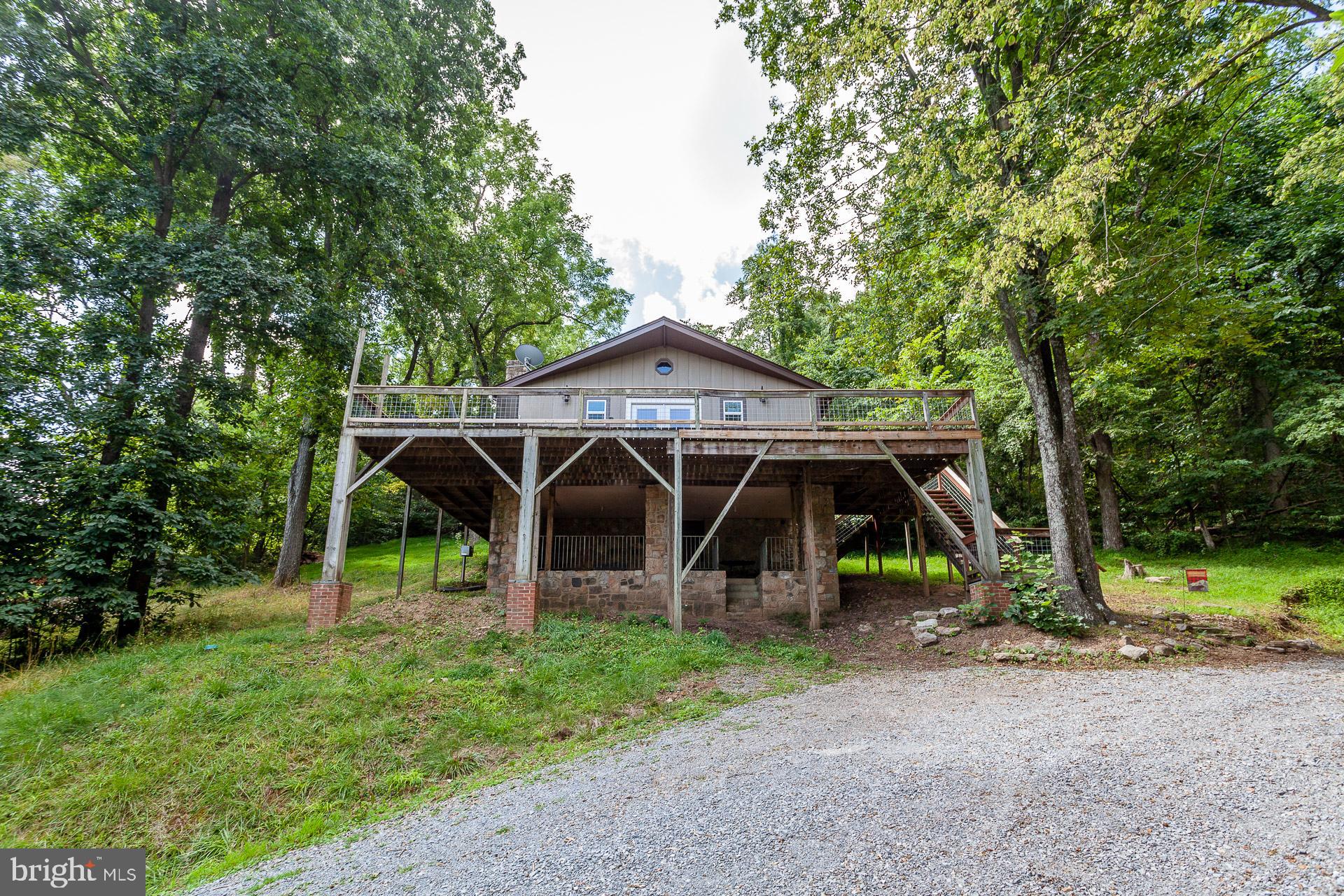 2668 Pine Grove Road Stanley, VA 22851 - Photo 2 of 35 a view of a house with backyard and a tree