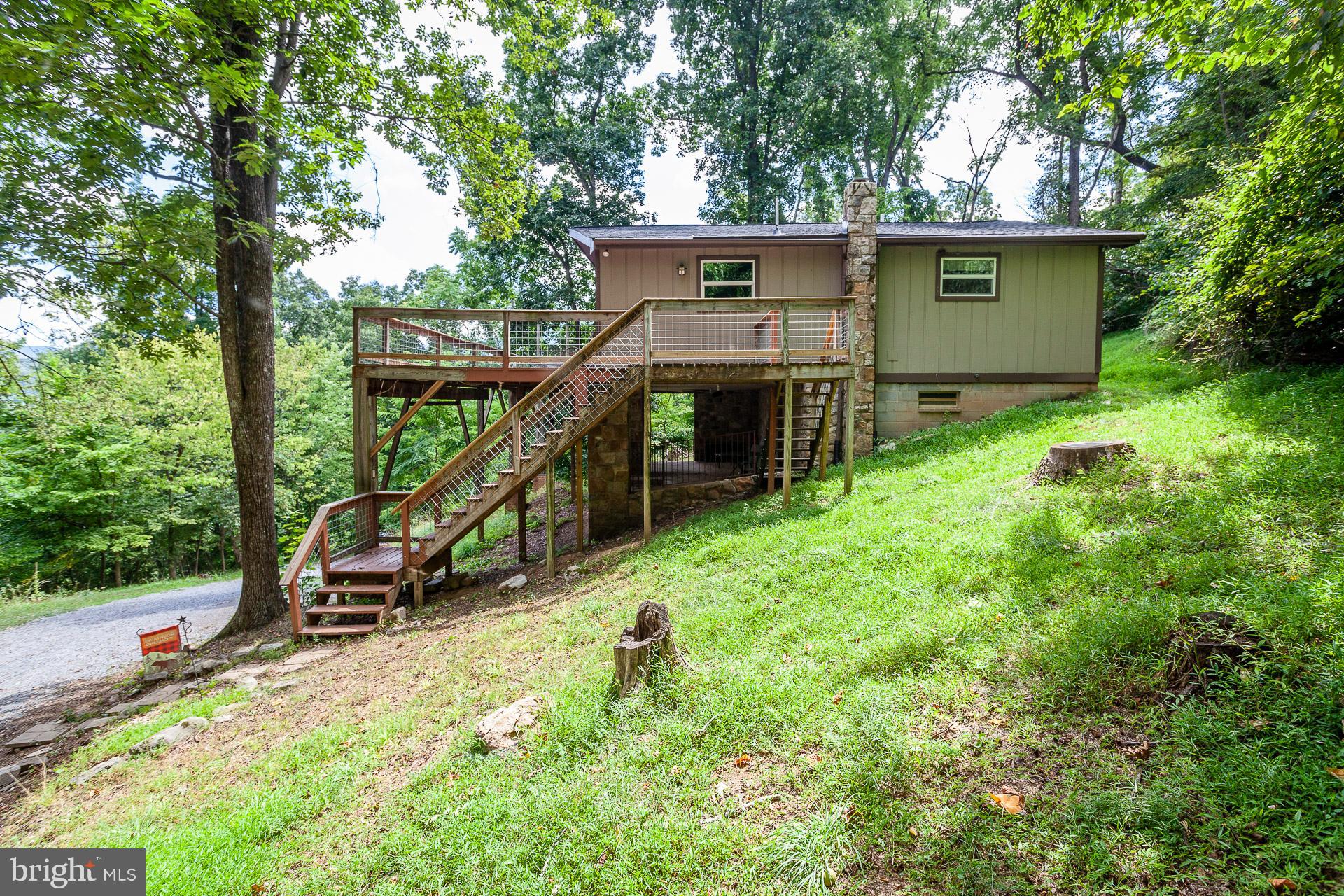 2668 Pine Grove Road Stanley, VA 22851 - Photo 6 of 35 a view of a house with a backyard
