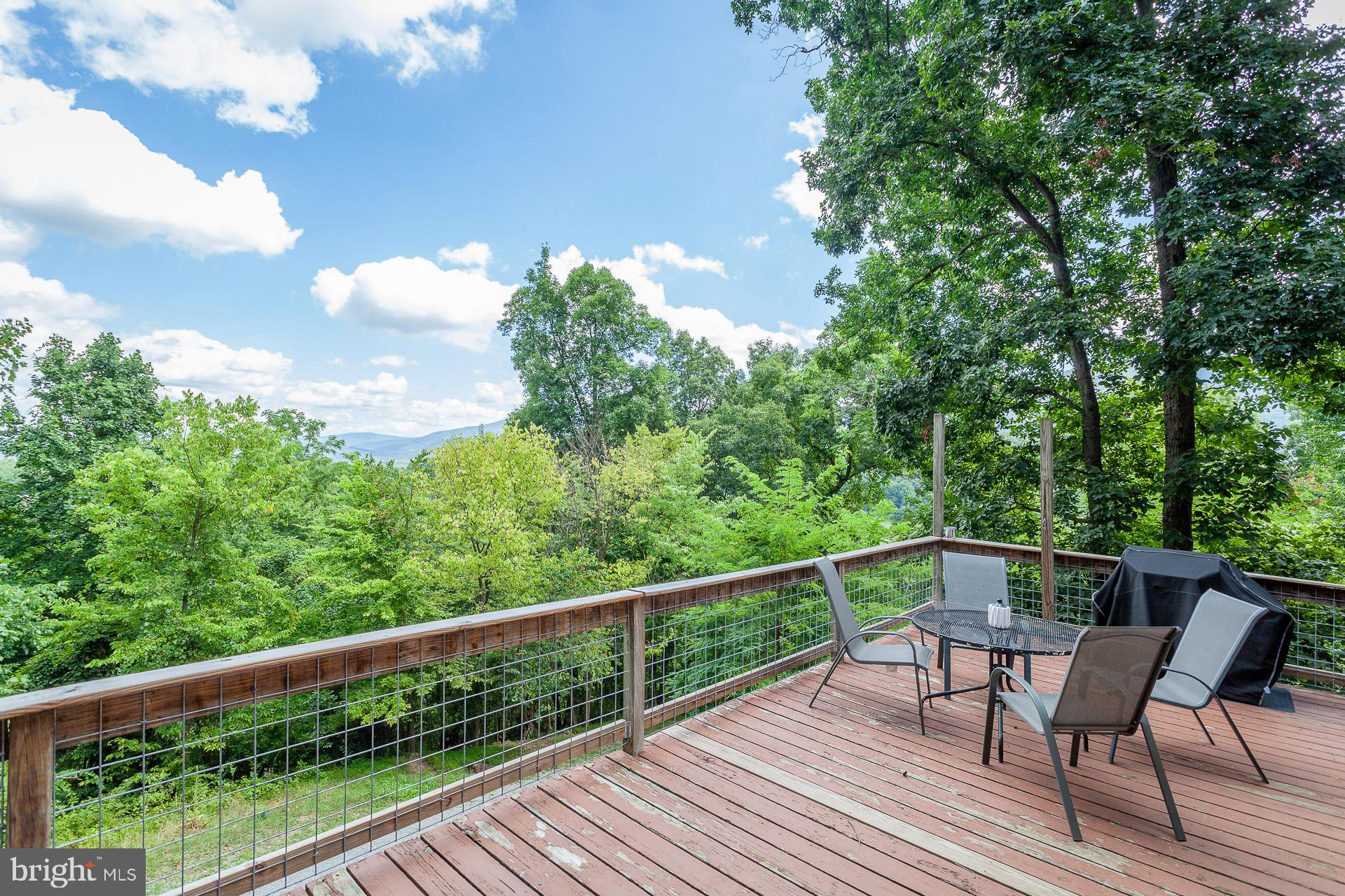 2668 Pine Grove Road Stanley, VA 22851 - Photo 7 of 35 a view of a balcony with furniture