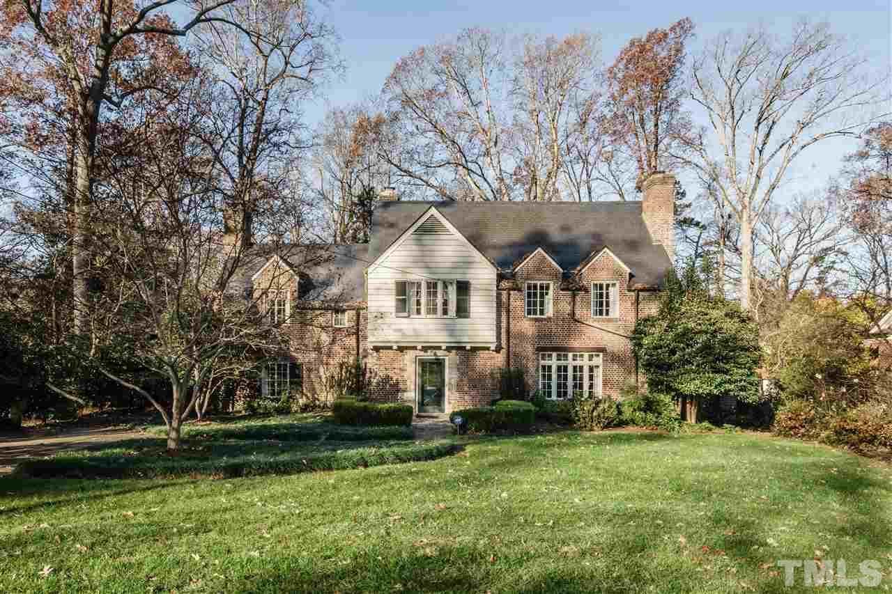 2515 White Oak Road Raleigh, NC 27609 - Photo 1 of 25 a front view of a house with a yard and trees