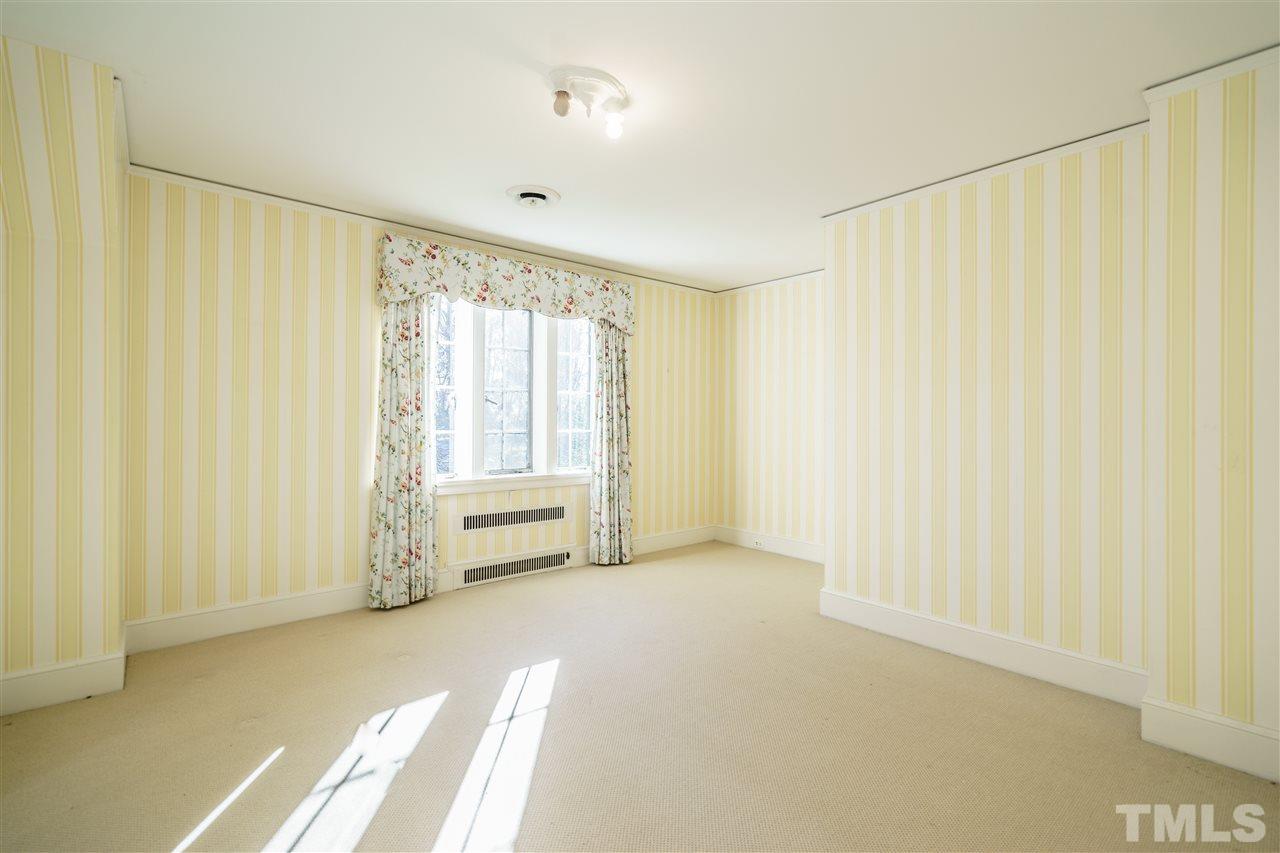 2515 White Oak Road Raleigh, NC 27609 - Photo 15 of 25 a view of an empty room with a window