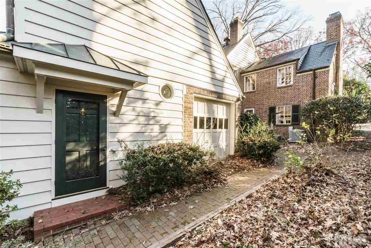 2515 White Oak Road Raleigh, NC 27609 - Photo 18 of 25 a view of a brick house with large windows