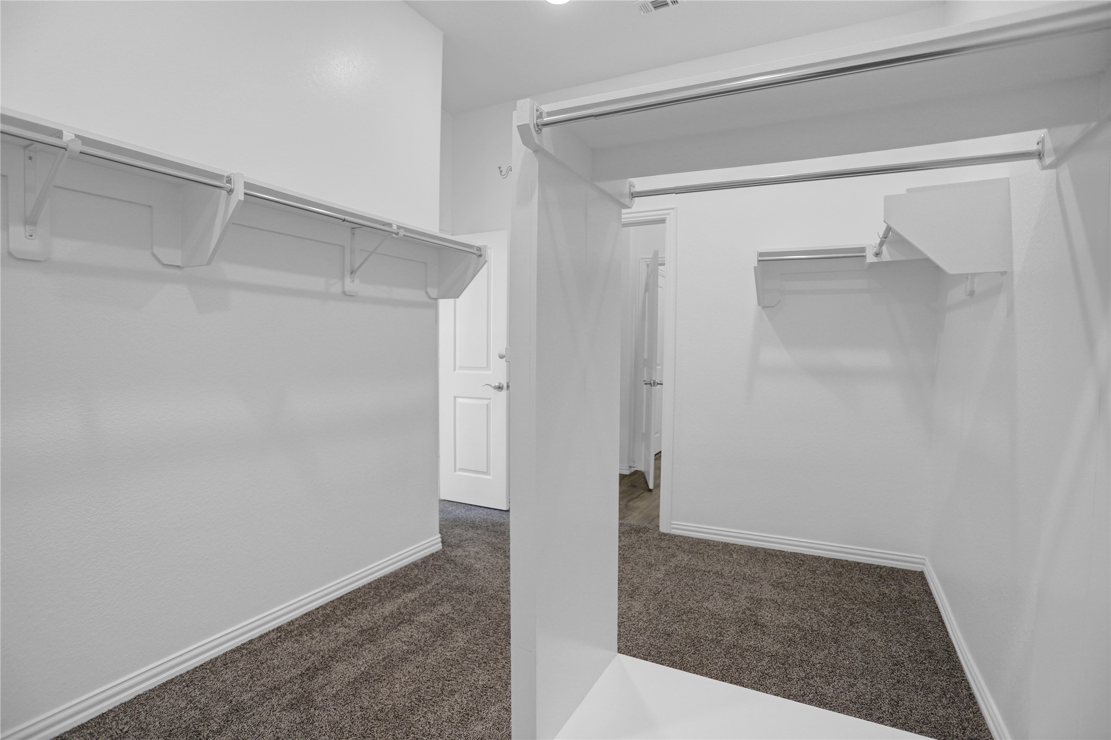 2718 Ripe Amber Cup Court Richmond, TX 77406 - Photo 17 of 43 a view of an empty walk in closet