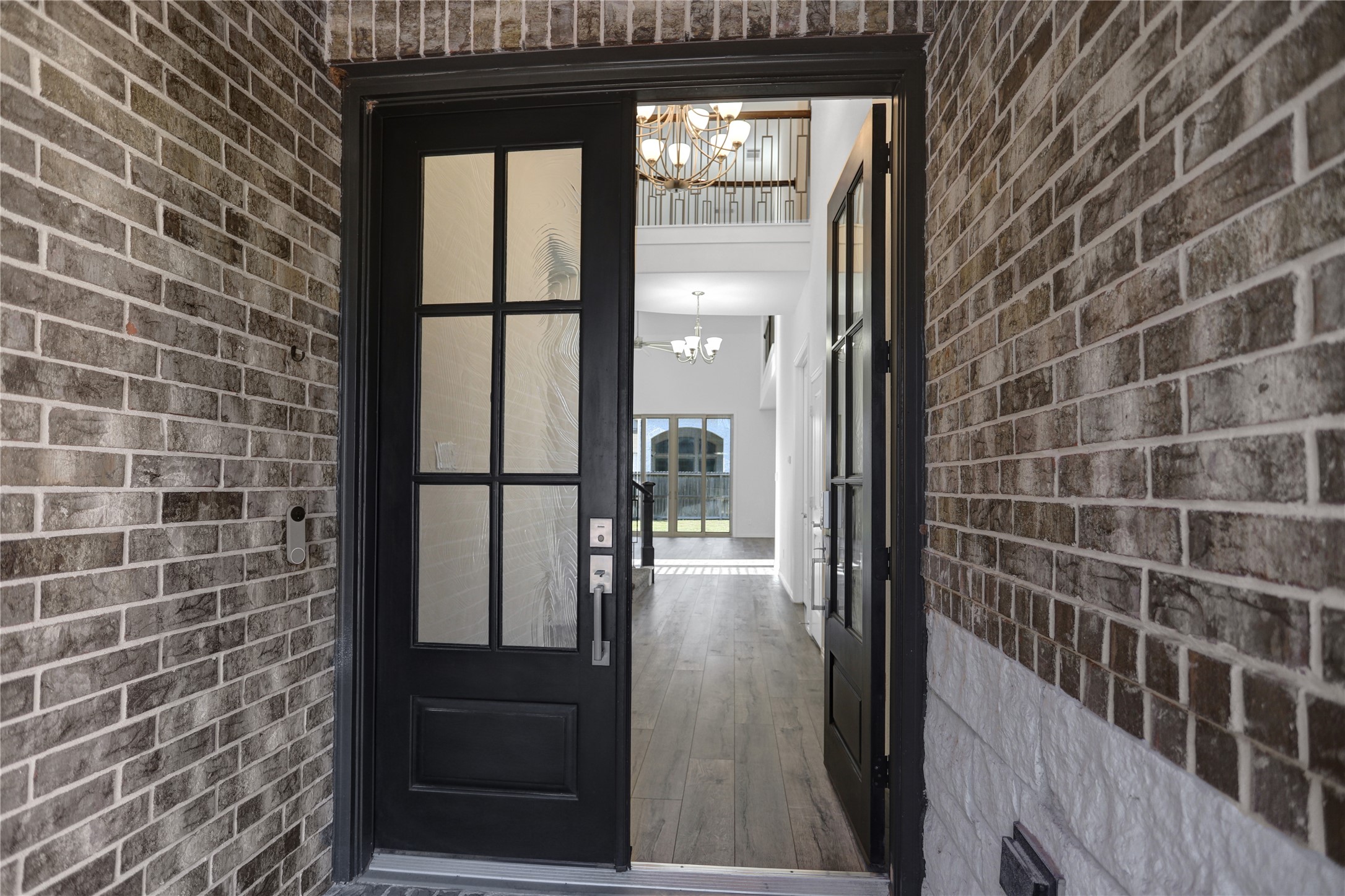 2718 Ripe Amber Cup Court Richmond, TX 77406 - Photo 2 of 43 a view of a glass door with glass windows