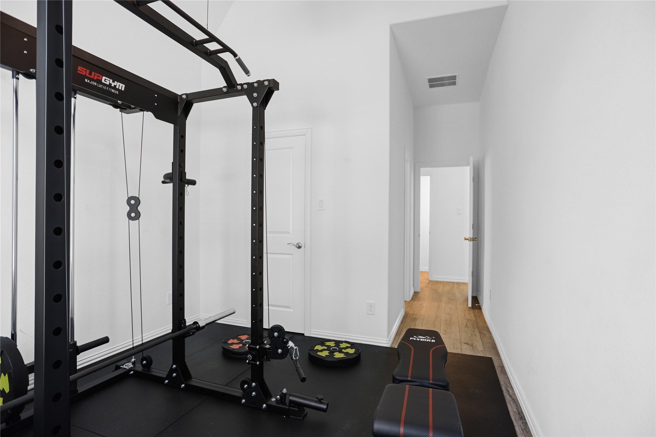 2718 Ripe Amber Cup Court Richmond, TX 77406 - Photo 22 of 43 a view of a room with gym equipment