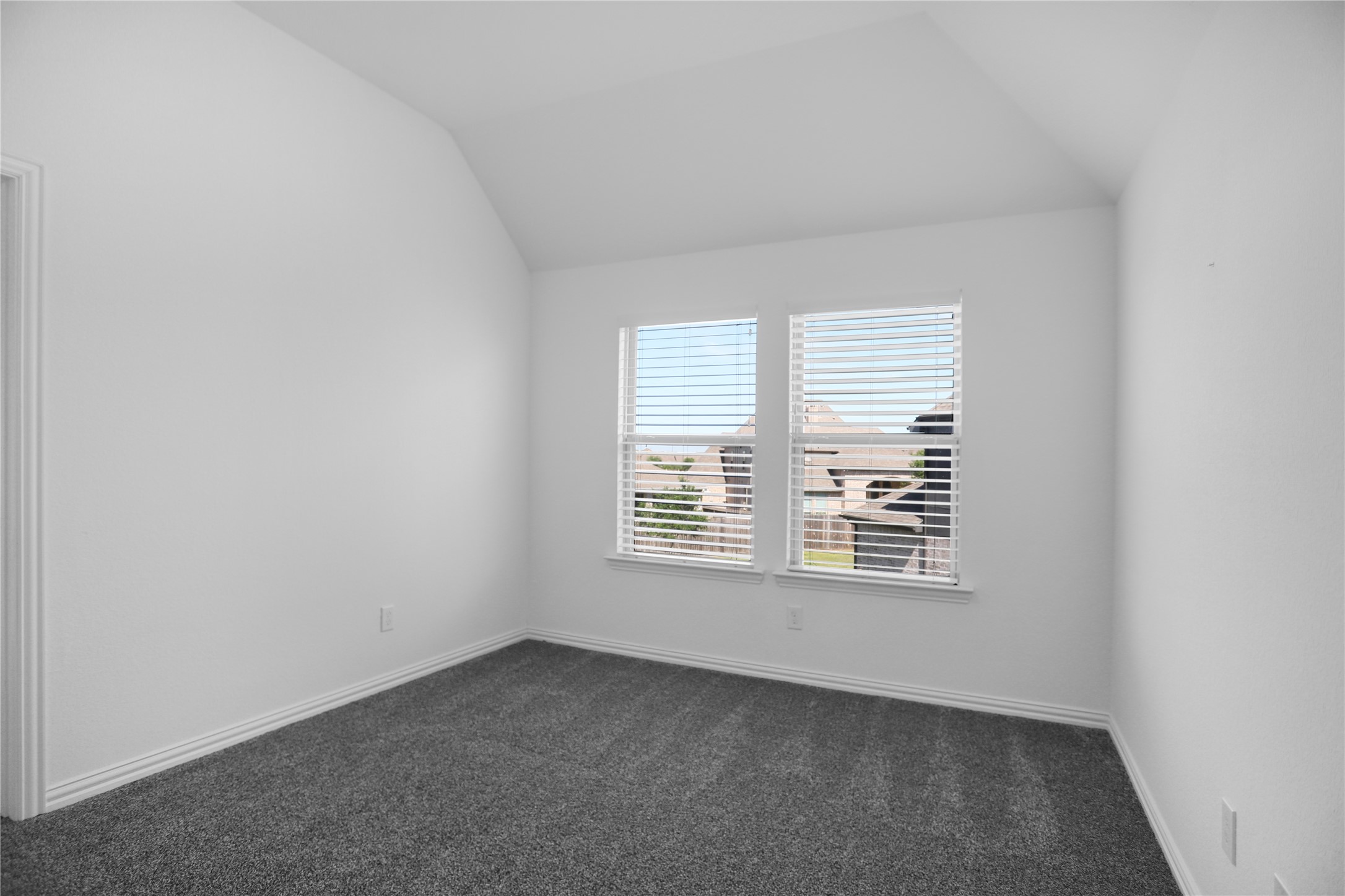 2718 Ripe Amber Cup Court Richmond, TX 77406 - Photo 25 of 43 a view of an empty room with a window