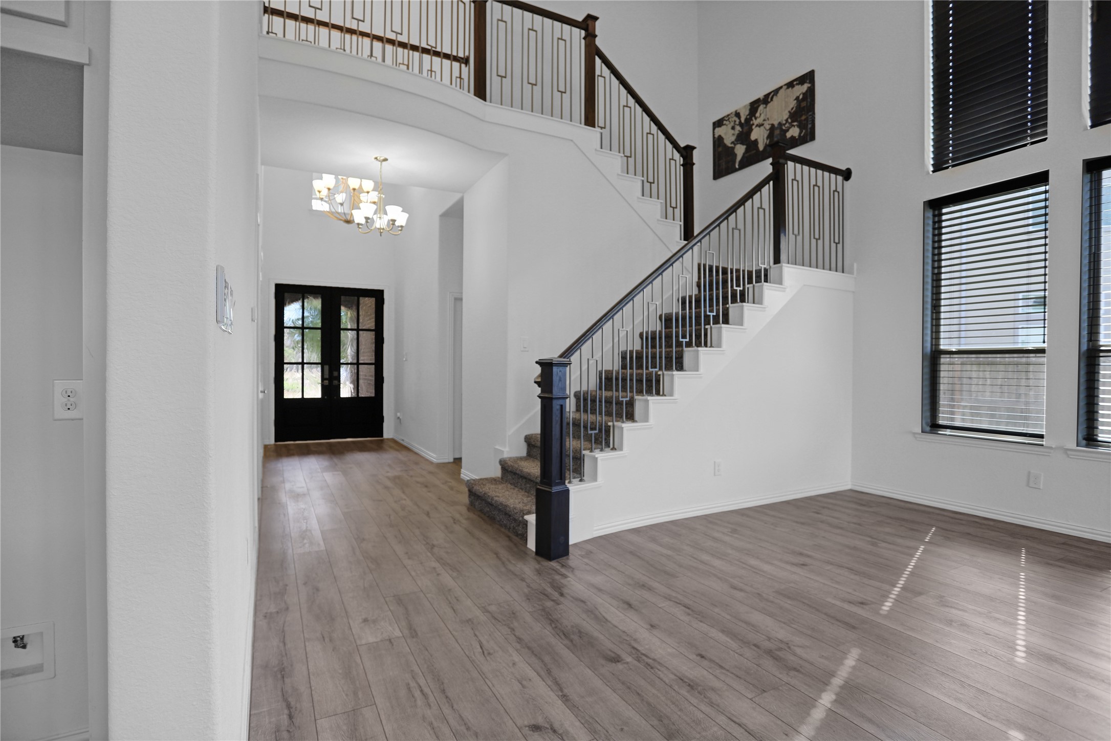 2718 Ripe Amber Cup Court Richmond, TX 77406 - Photo 8 of 43 a view of entryway and hall with wooden floor