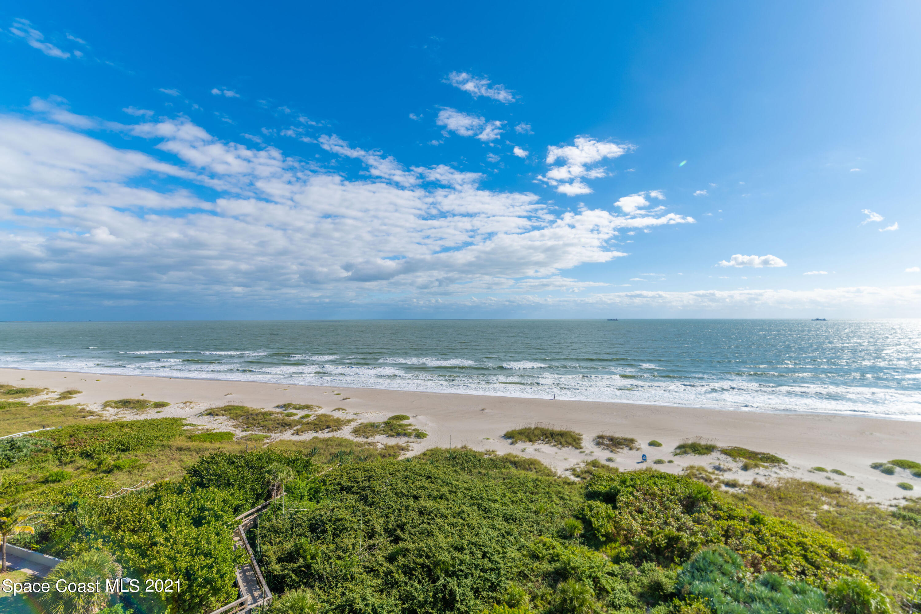 6770 Ridgewood Avenue, Unit 1002 Cocoa Beach, FL 32931 - Photo 6 of 16 a view of an ocean and beach