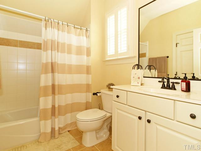 3513 Mt Prospect Circle Raleigh, NC 27614 - Photo 19 of 23 Large second floor bathroom with custom tile work. Bathroom