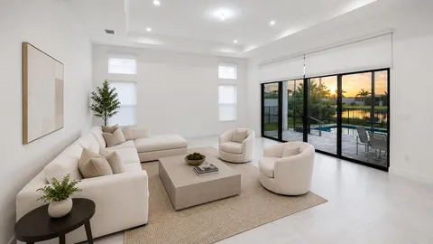a kitchen with stainless steel appliances a refrigerator a stove a microwave and cabinets