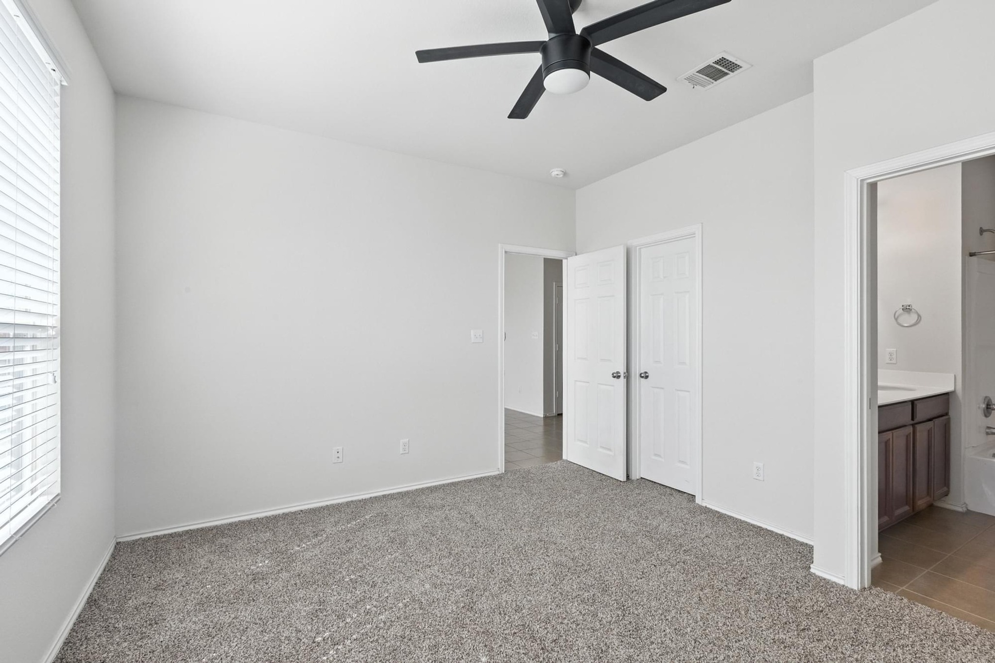 4617 Cleto Street Austin, TX 78725 - Photo 17 of 26 a view of an empty room and window