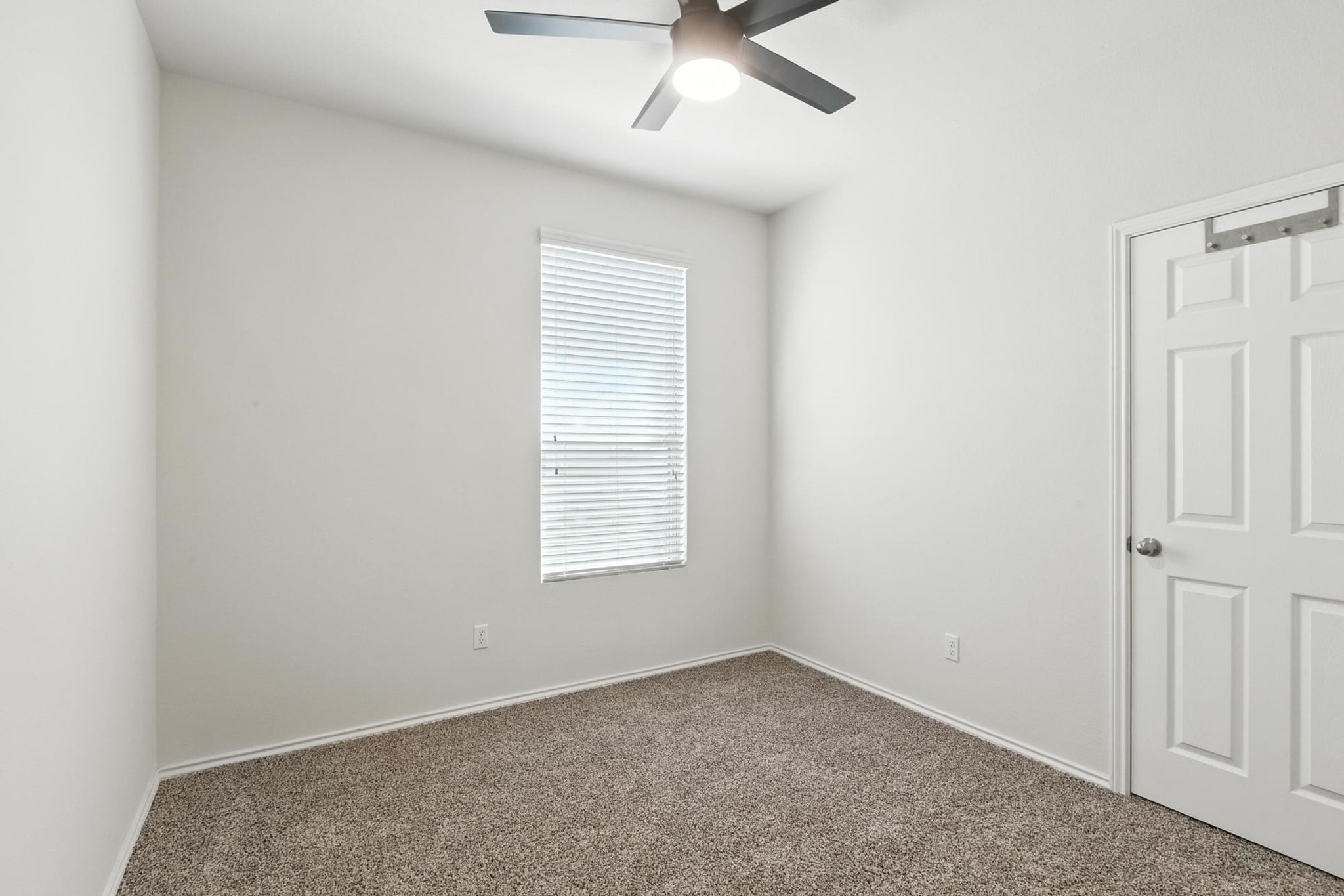 4617 Cleto Street Austin, TX 78725 - Photo 21 of 26 an empty room with a window