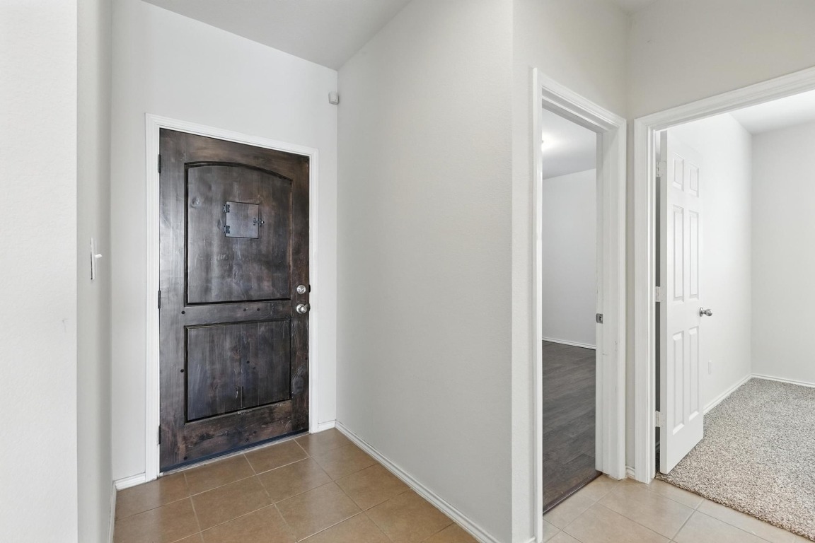 4617 Cleto Street Austin, TX 78725 - Photo 8 of 26 a view of a hallway with elevator