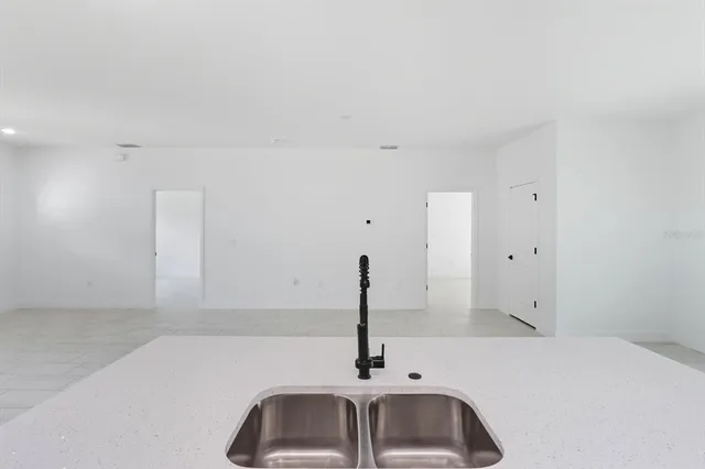 a kitchen with a stove and a microwave