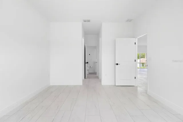 an empty room with windows