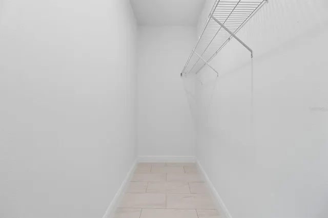 a bathroom with a sink vanity mirror and toilet