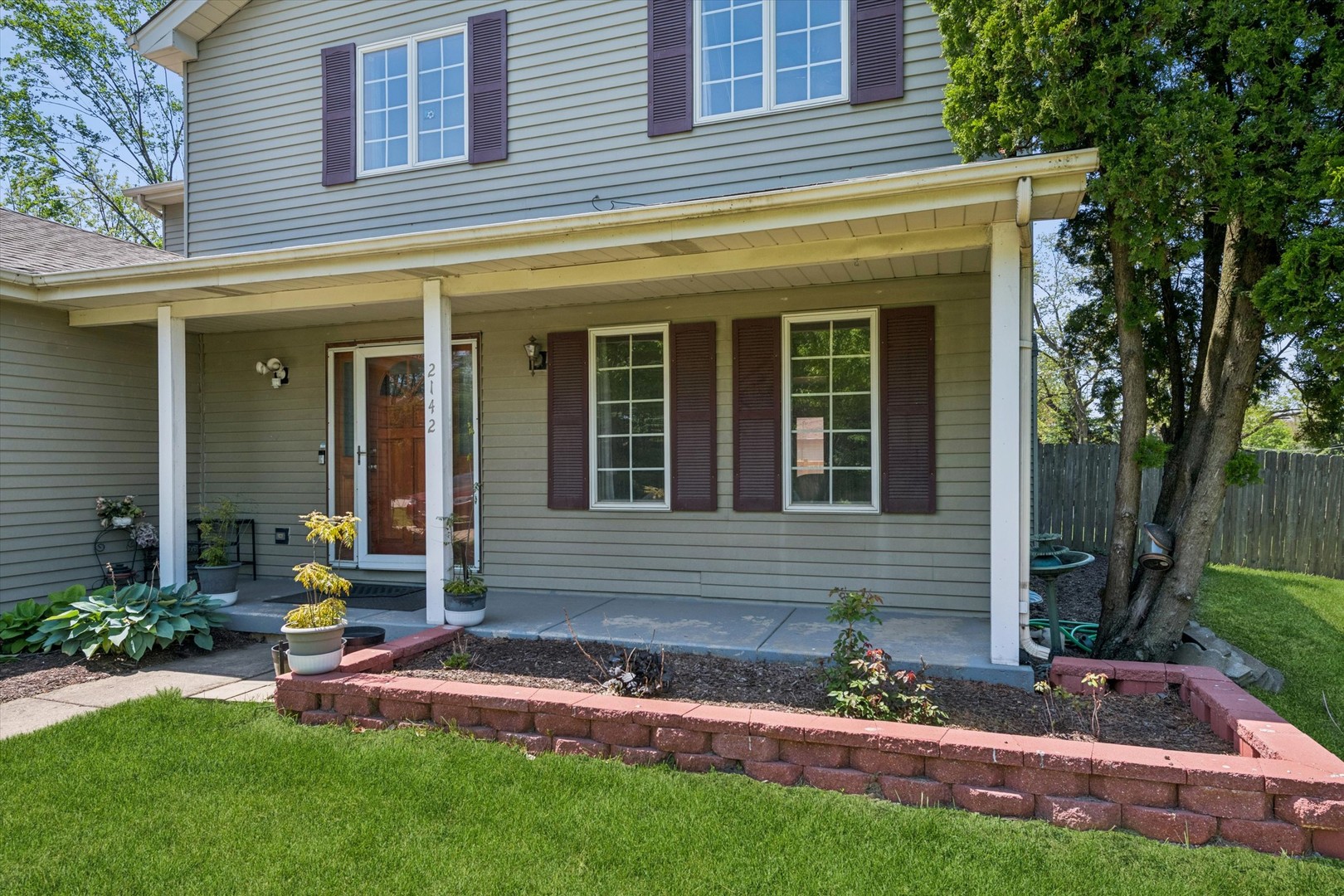 2142 North Summit Street Wheaton, IL 60187 - Photo 2 of 35 front view of house with a yard
