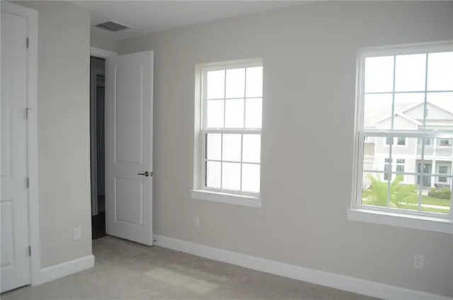 a view of staircase with wooden floor and fence