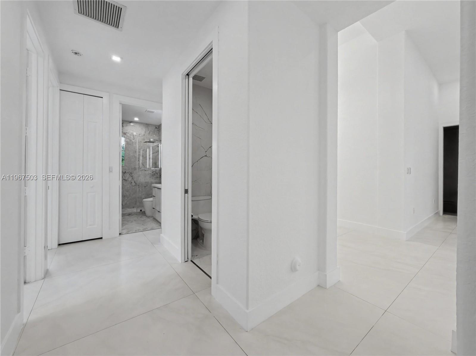 7733 Southwest 193rd Street Cutler Bay, FL 33157 - Photo 18 of 36 a view of a hallway
