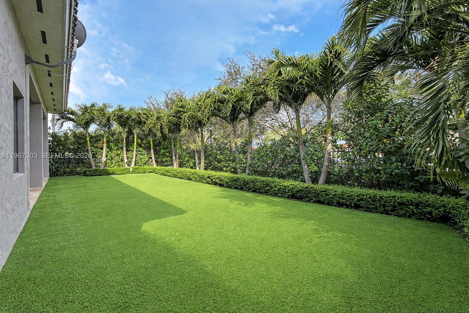 7733 Southwest 193rd Street Cutler Bay, FL 33157 - Photo 30 of 36 a view of a park with a tree in the background