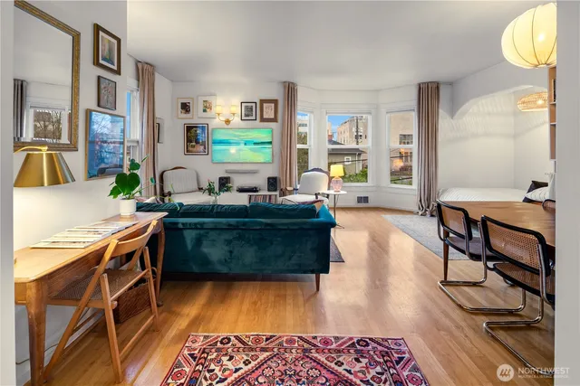 a room with furniture and a wooden floor