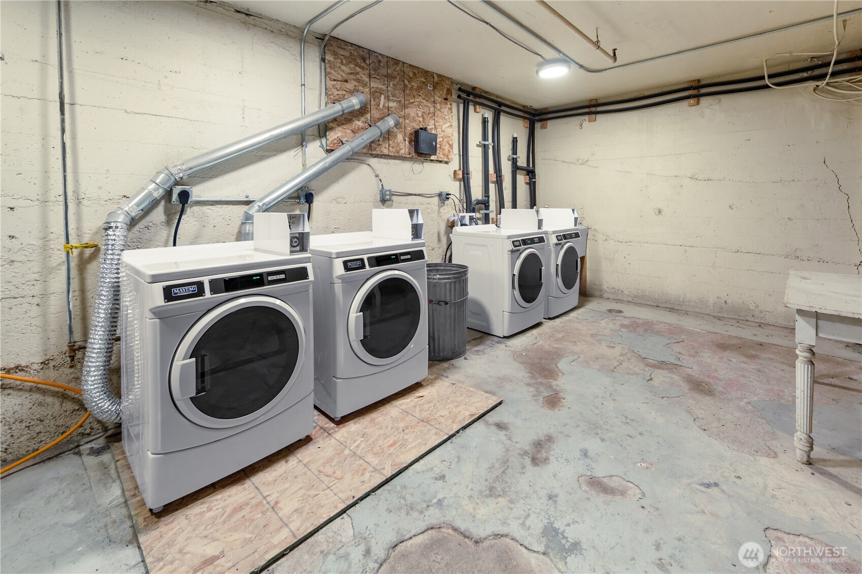 1732 15th Avenue, Unit 27 Seattle, WA 98122 - Photo 25 of 27 a utility room with dryer and washer