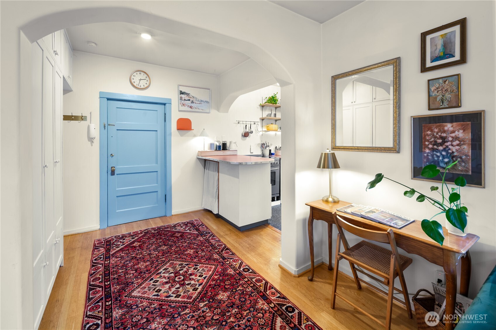 1732 15th Avenue, Unit 27 Seattle, WA 98122 - Photo 3 of 27 a workspace room with furniture and a window