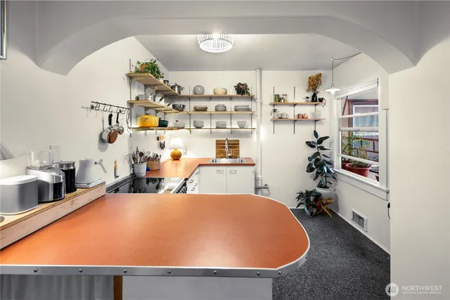 a room with table and chairs