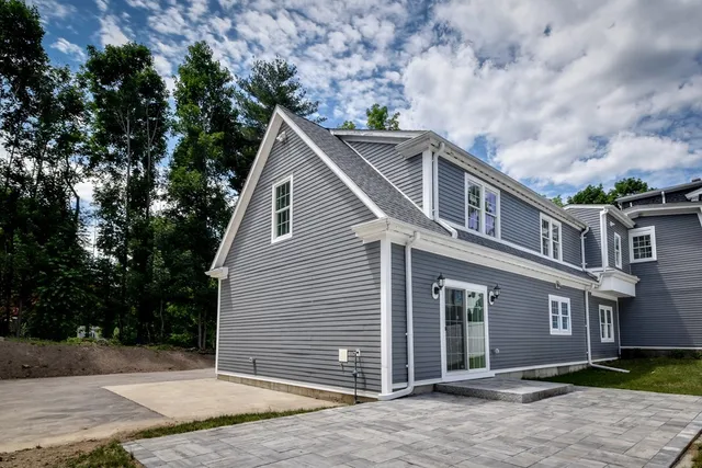 a view of a house with a garage