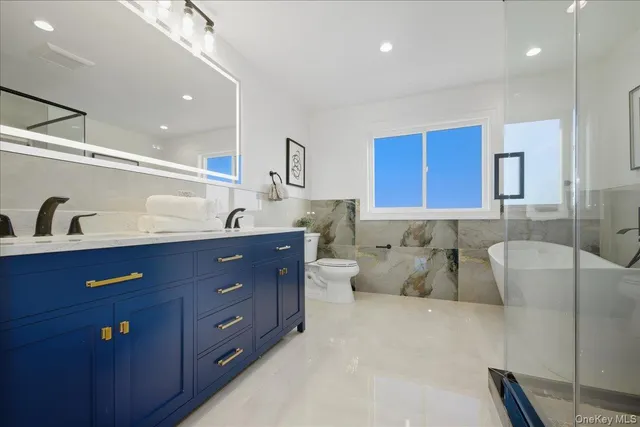 a view of an empty room with a closet