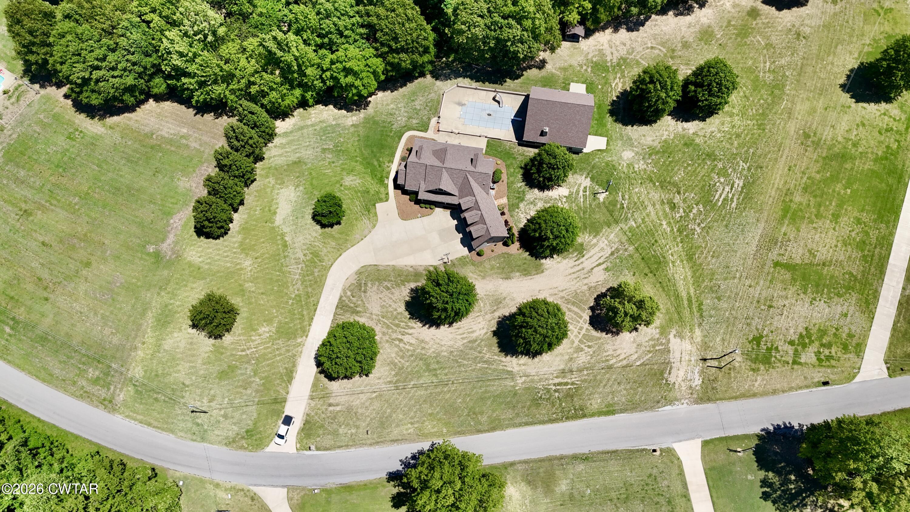227 Willie Johnson Road Dyersburg, TN 38024 - Photo 43 of 43 an aerial view of a residential houses with yard